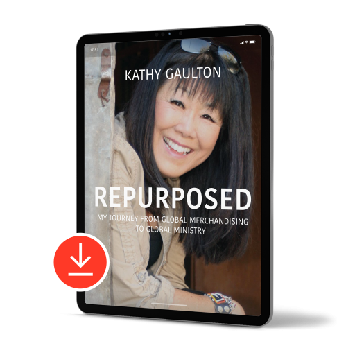 Tablet with red download symbol. Graphic of Cover of book Repurposed by Kathy Gaulton. Photo of Kathy Gaulton.