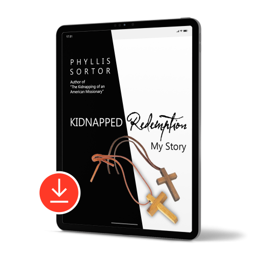 Tablet with red download symbol. Graphic of Cover of book Kidnapped Redemption My Story by Phyllis Sortor. Black and White with 2 wooden crosses.
